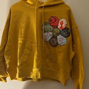 Yellow Hoodie with Colorful Patch Design by Disney